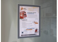 Selfadhesive magnetic foil A3 on a wall of glass