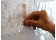 Magnetic pockets A5 as an example on a whiteboard